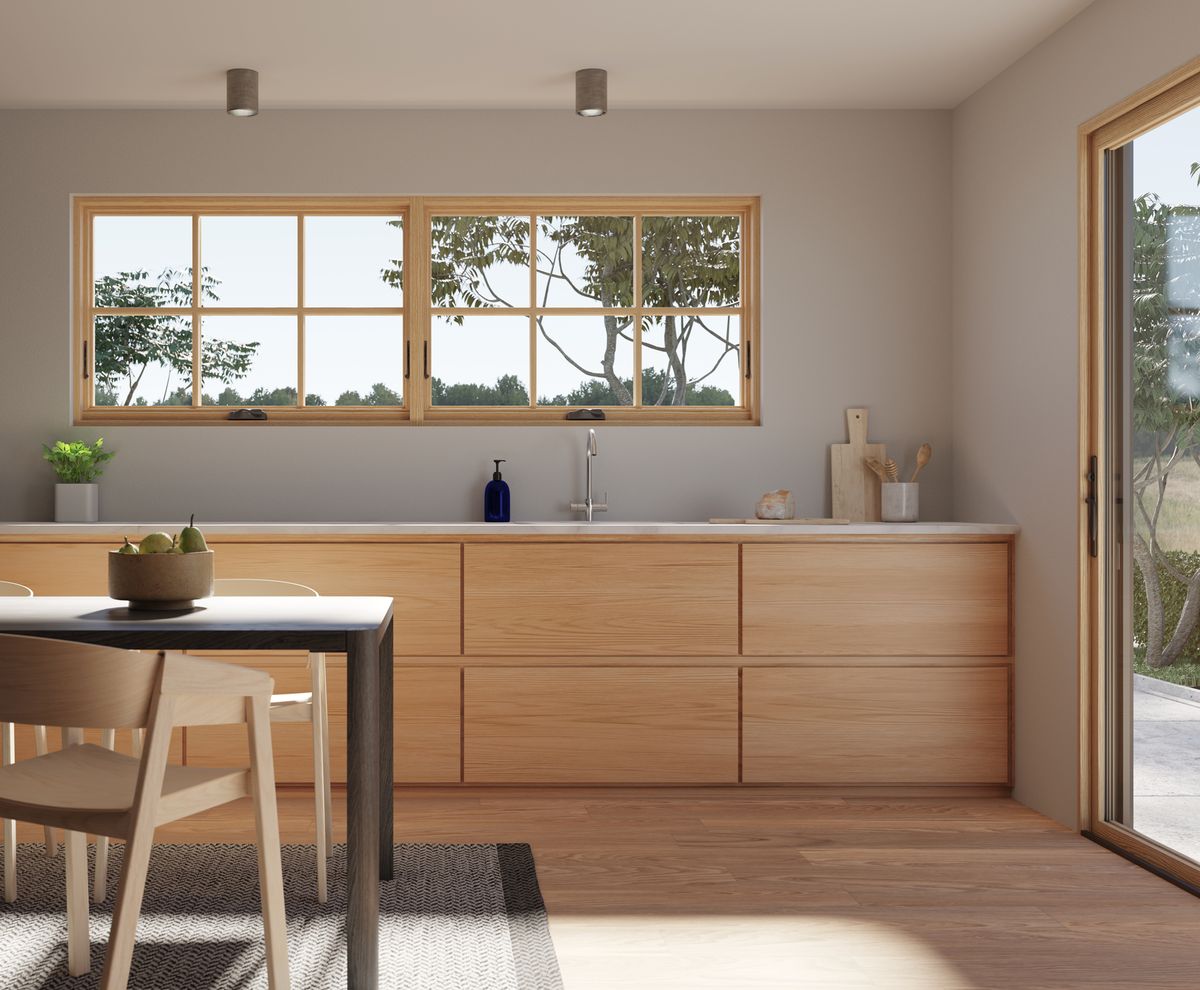 Marvin Elevate sliding patio door and narrow-frame windows in a kitchen